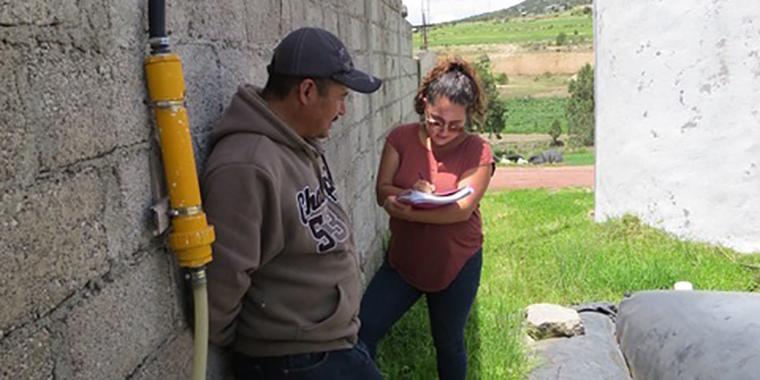 Julieta is interviewing a customer on his farm in Tlaxcala image link to story