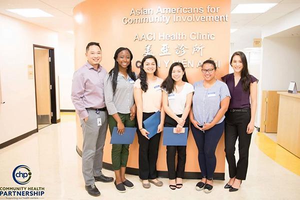 Community Health Partnership intern Kayla Williams -second from left- with Asian Americans for Community Involvement staff