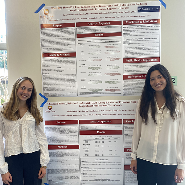 Carly Petersen (left) and Stella Palumbo (right) present their research findings at the 2025 SCU Alumni Science Conference.