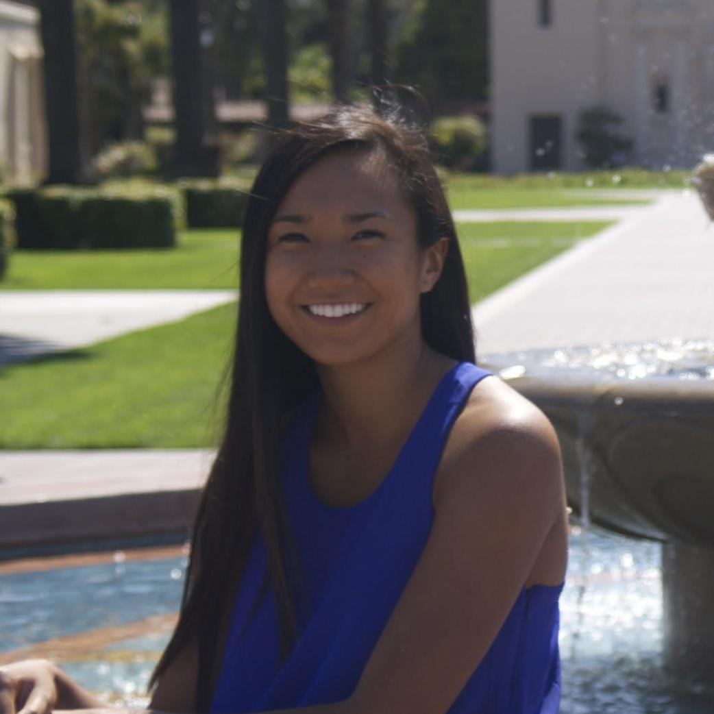 A person in front of a fountain with a building in the background. image link to story
