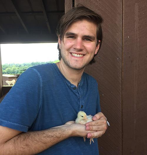 Nick Nagy holding a chick