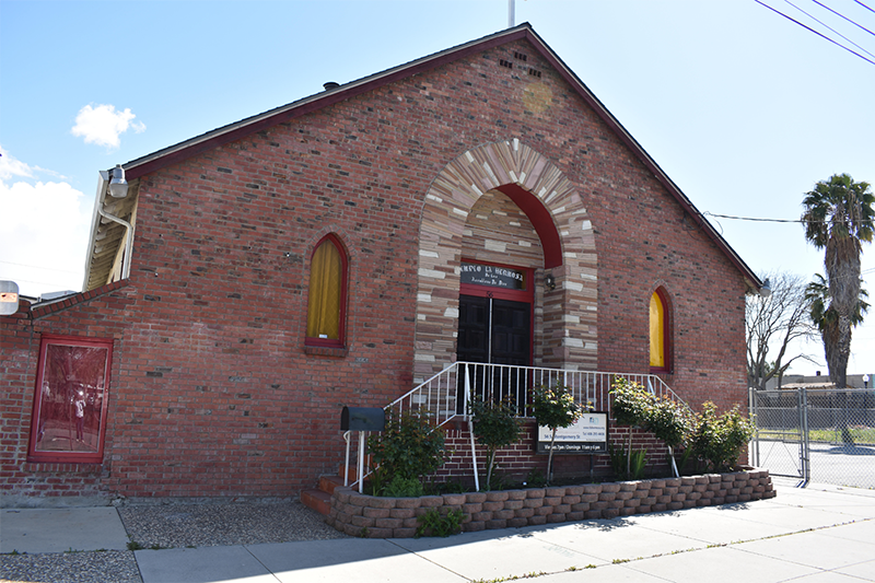 Templo La Hermosa Church on Montgomery St., across from Diridon Station, was one of the early displacements of religious communities that support ministries to immigrants and the unhoused in San Jose. The property was sold to Google in 2020 to avoid the risk of seizure through eminent domain.  (Photo by Elizabeth Drescher, 2020).