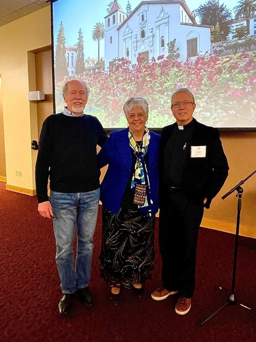 Three individuals posing together at the 'AMPineda RSM Lecture 2022'.
