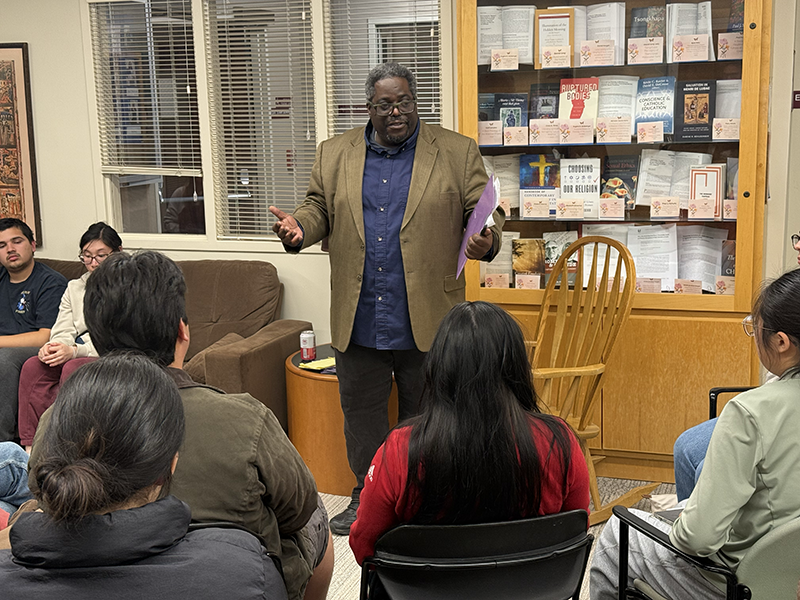 Karl Lampley standing and leading a disccussion with students. image link to story