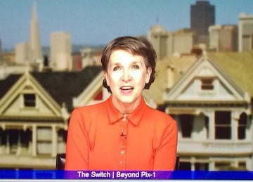 A person named Sally speaking with Victorian houses in the background. image link to story