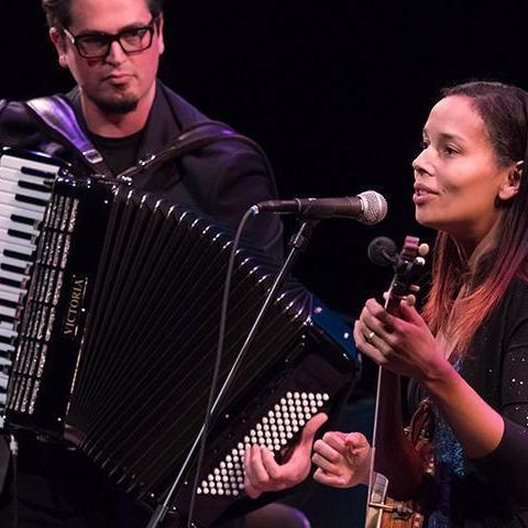 Rhiannon Giddens playing her banjo on stage with Francesco Turrisi on accordion. Photos by Charles Barry. 