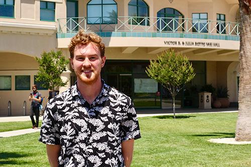 Zachary Gianotti standing in front of Vari Hall image link to story