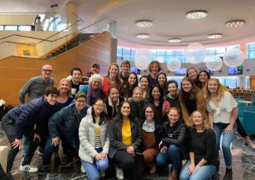 Group photo of New York Alumni 2019 at indoor brunch event. image link to story