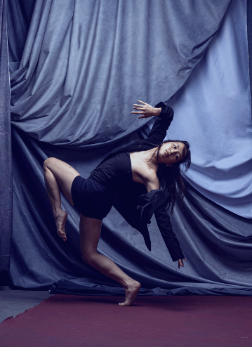 female dancer in black shirt and shorts, credit Tony Nugyen