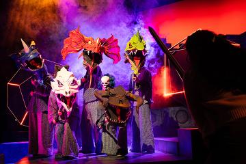 5 monster puppets as see over the shoulder of a quester
