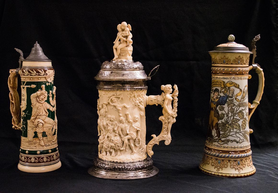 Three decorative beer steins from the museum's collection.