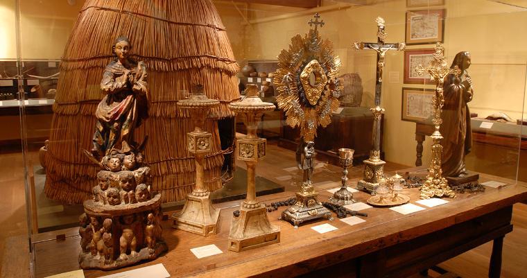 Installation view of Mission Period objects in California History exhibit.