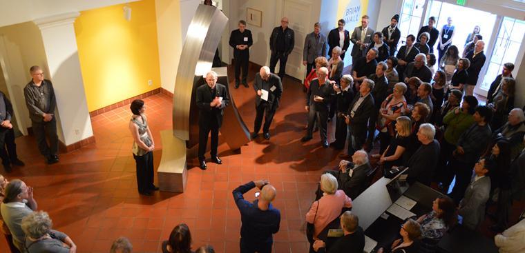 Museum members gather for an exclusive exhibition preview.