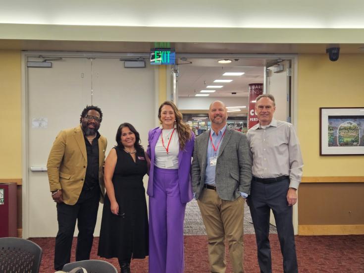 A group of people attending Latinx summit