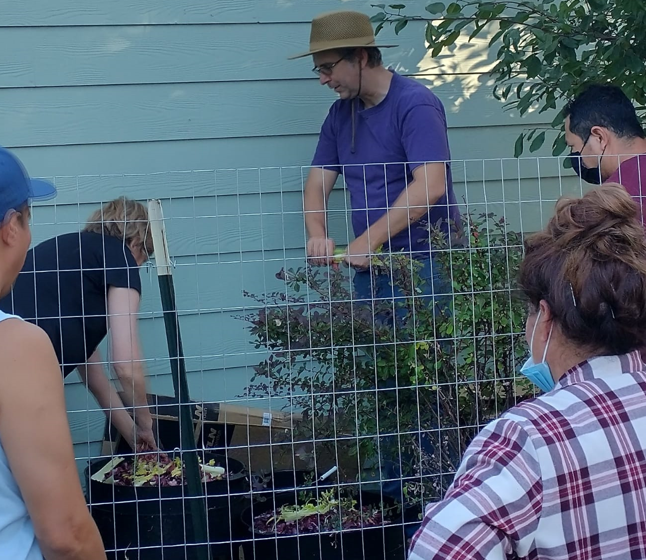 Program members working on worm composting