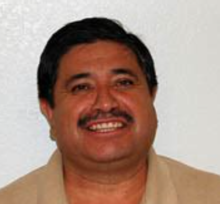 headshot of Gustavo Aguirre