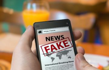 Fake news on a mobile phone image link to story