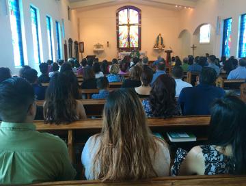 Catholic Worshippers  (AP Photo/Tassanee Vejpongsa)