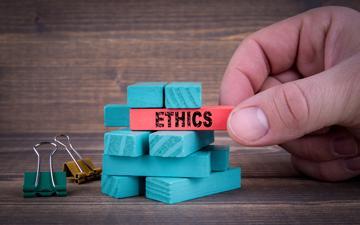 Ethics written on a Jenga block