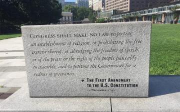 stone engraved with First Amendment