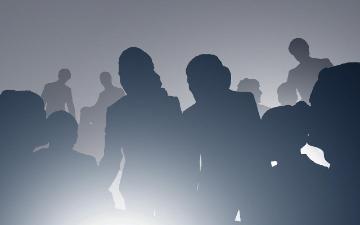 Silhouettes of people gathered in discussion. Photo by geralt_Pixabay.