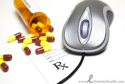 Pills and a computer mouse