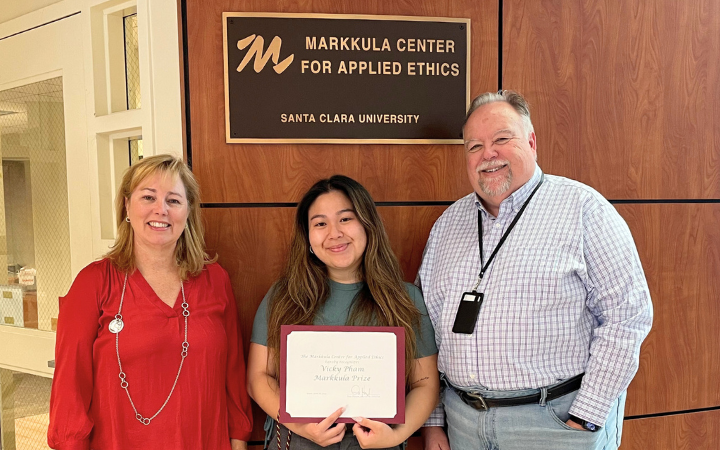 2023 Markkula Prize winner, Vicky Pham is congratulated by Ethics Center Executive Director Don Heider and Advisory Board member Kristi Bowers.