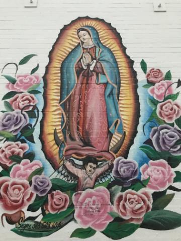 A mural of Our Lady of Guadalupe in the Boyle Heights neighborhood in LA where the Catholic Worker community is located. Photo by David DeCosse, 2021