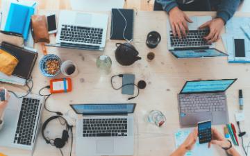 Office workspace with laptops. Tech ethics are increasingly being embedded into the culture of tech companies Image: Photo by Marvin Meyer on Unsplash