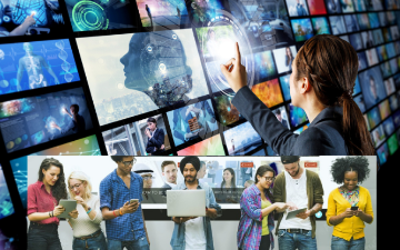 Wall of media panels and woman selecting items from the screen. Below, individual people with smart phones and tablets are shown using their devices to receive information.