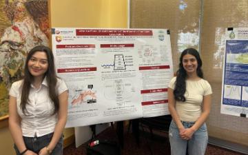 Hannah Hamawi ‘27, and Mahi Shah ‘28, presenting their project at the SCU Sust
