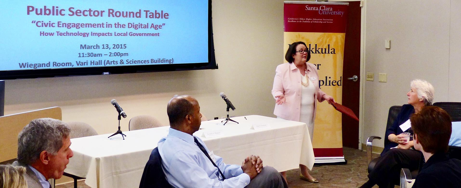Hana Callaghan welcomes participants to the Public Sector Roundtable.