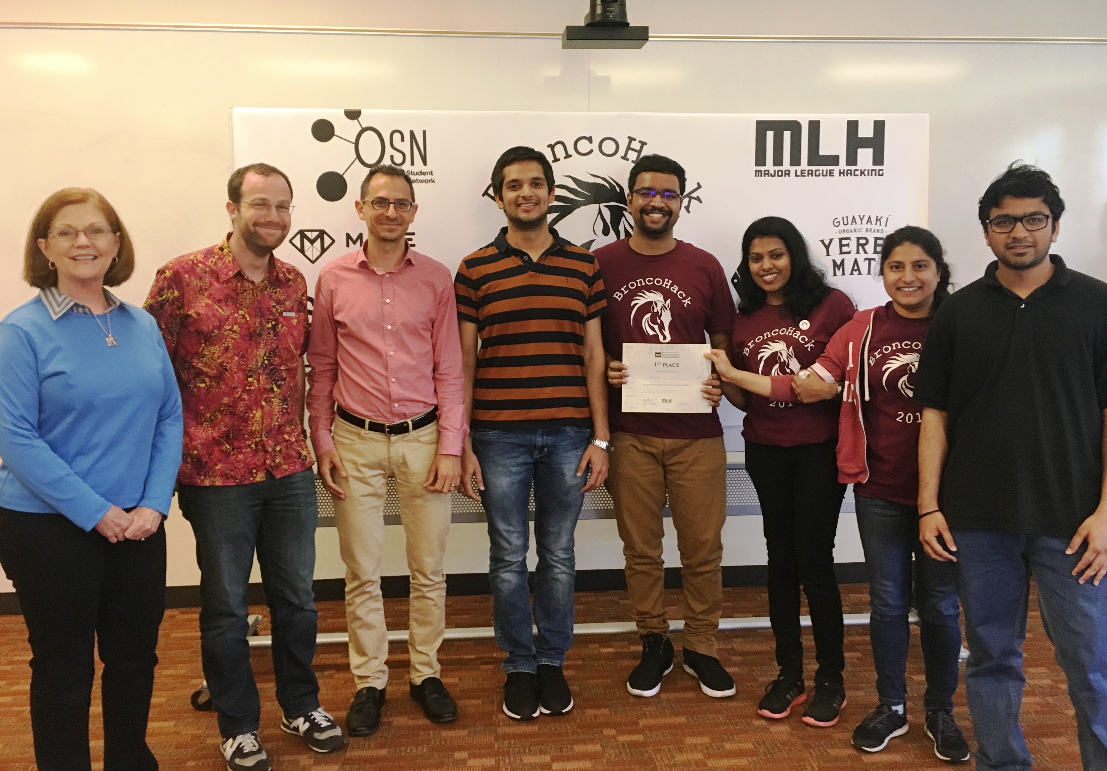 students from the winning team and judges