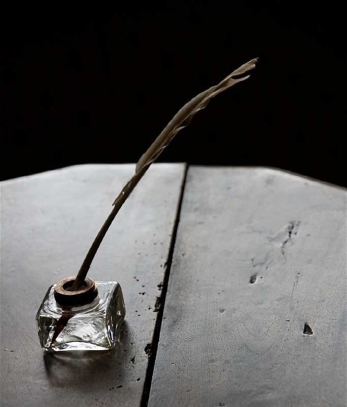 ink bottle with quill