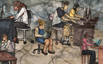 Workers at computers, facing in different directions