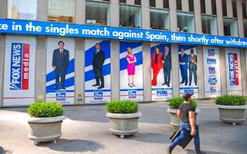 Promotional posters outside Fox News studios at News Corporation headquarters in New York. (AP Photo/Ted Shaffrey)