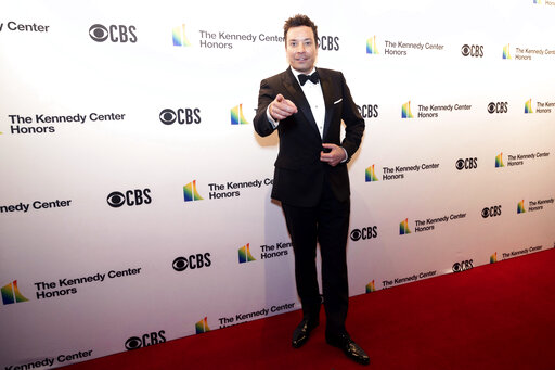 Jimmy Fallon poses on the red carpet at the honors gala for the 44th Kennedy Center Honors on Sunday, Dec. 5, 2021, in Washington. (Kevin Wolf/AP Photo)