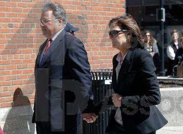 Manuel and Elizabeth Henriquez arrive at federal court in Boston on Wednesday, April 3, 2019, to face charges in a nationwide college admissions bribery scandal. (AP Photo/Steven Senne). image link to story