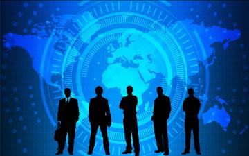 silhouette of five business people with world map image in the background image link to story