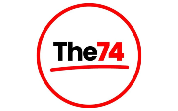 Black and Red The 74 Logo image link to story