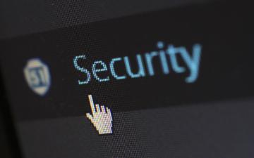 Cursor pointing at the word Security on a screen. image link to story