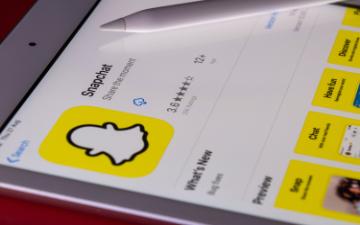 Snapchat app open on a tablet showing the apps interface. image link to story