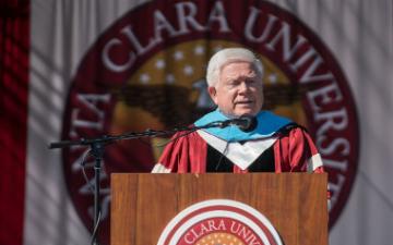 A person speaking at a podium with a Santa Clara University backdrop. image link to story