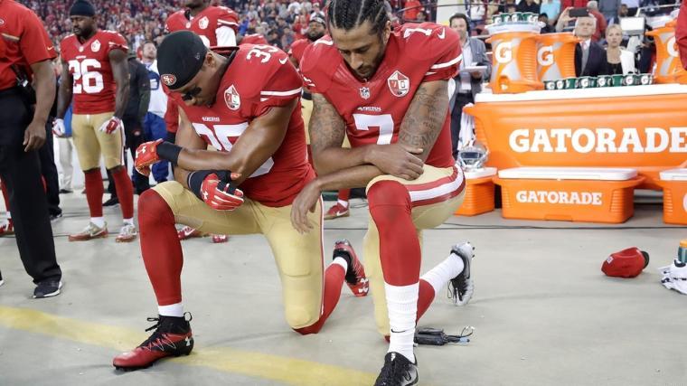 Eric Reid and Colin Kaepernick kneeling (AP Photo/Marcio Jose Sanchez, File)