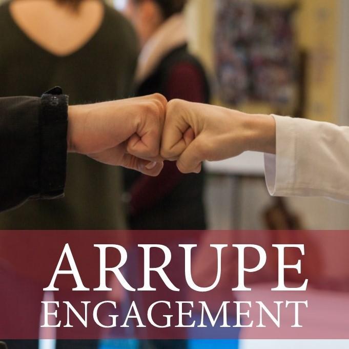 Arrupe Engagement Title with Fist Bump Image image link to story