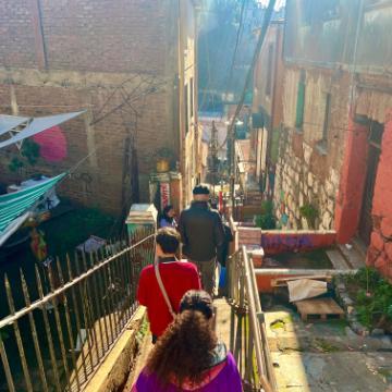 SM25 Chile - walking down stairs in city image link to story