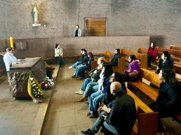 SM25 Chile - Group takes a moment of prayer at Saint Alberto Hurtado’s shrine