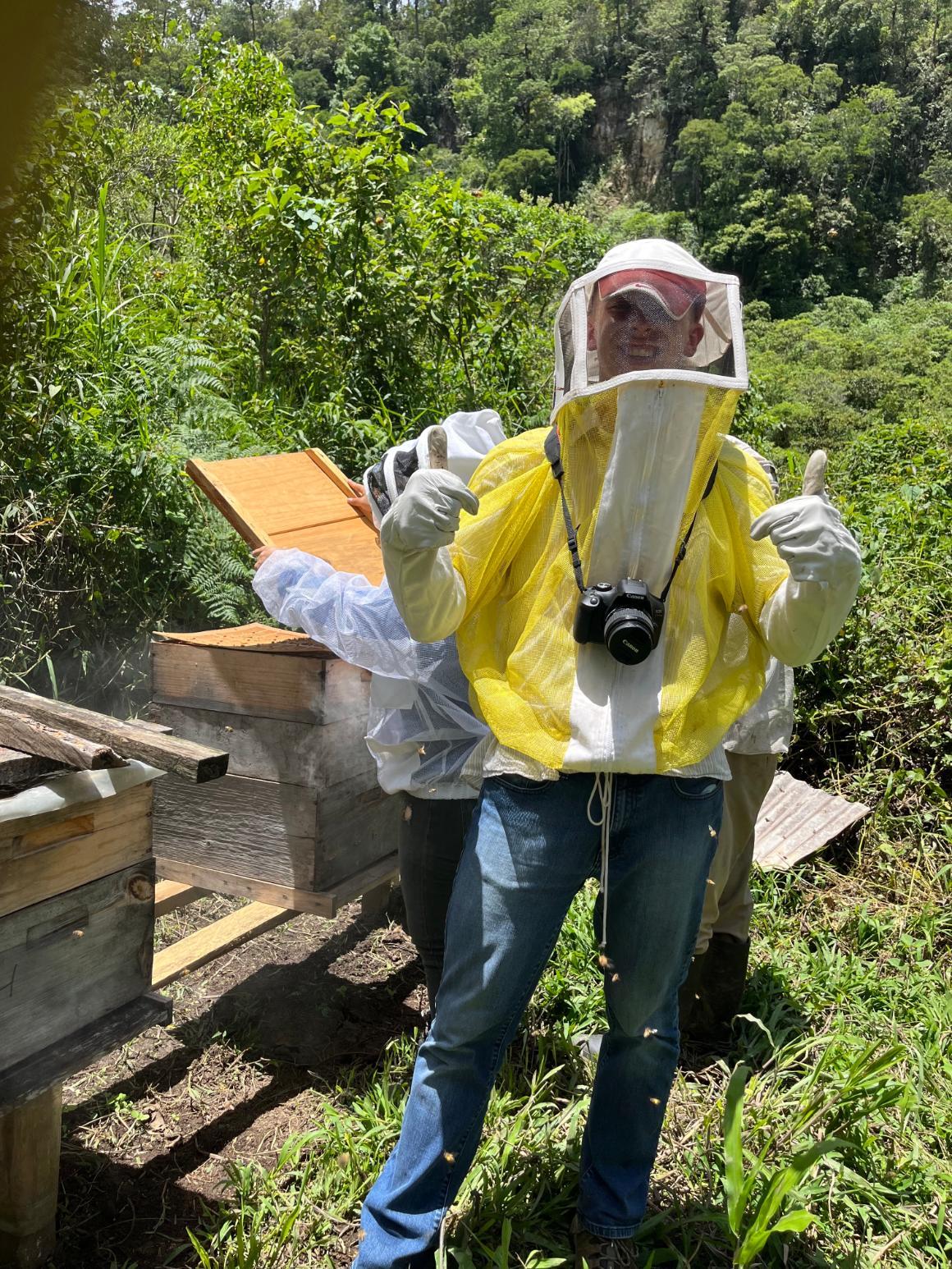 Christopher Lane in beekeeping outfit