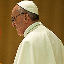 A pope wearing a white robe and a white zucchetto.