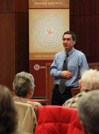A speaker giving a presentation to an audience.